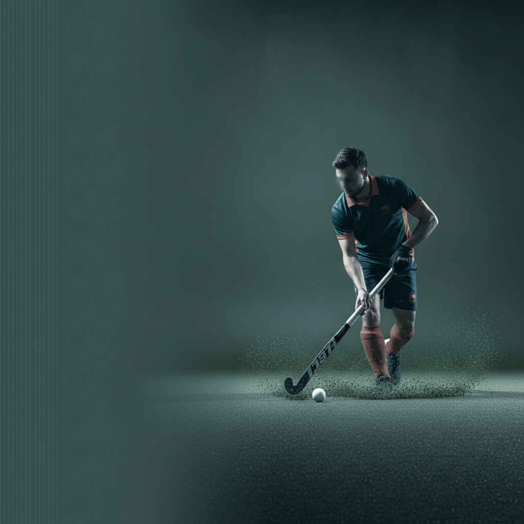 Field hockey player controlling the ball on turf